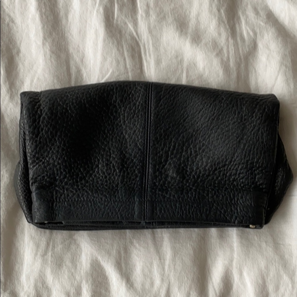 Toni black leather clutch